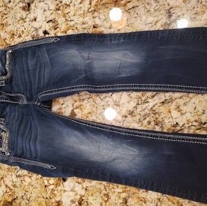 Pair of Rock Revival crop jeans